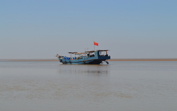 Fishing boat on the Yellow River; the boats often become scientific 